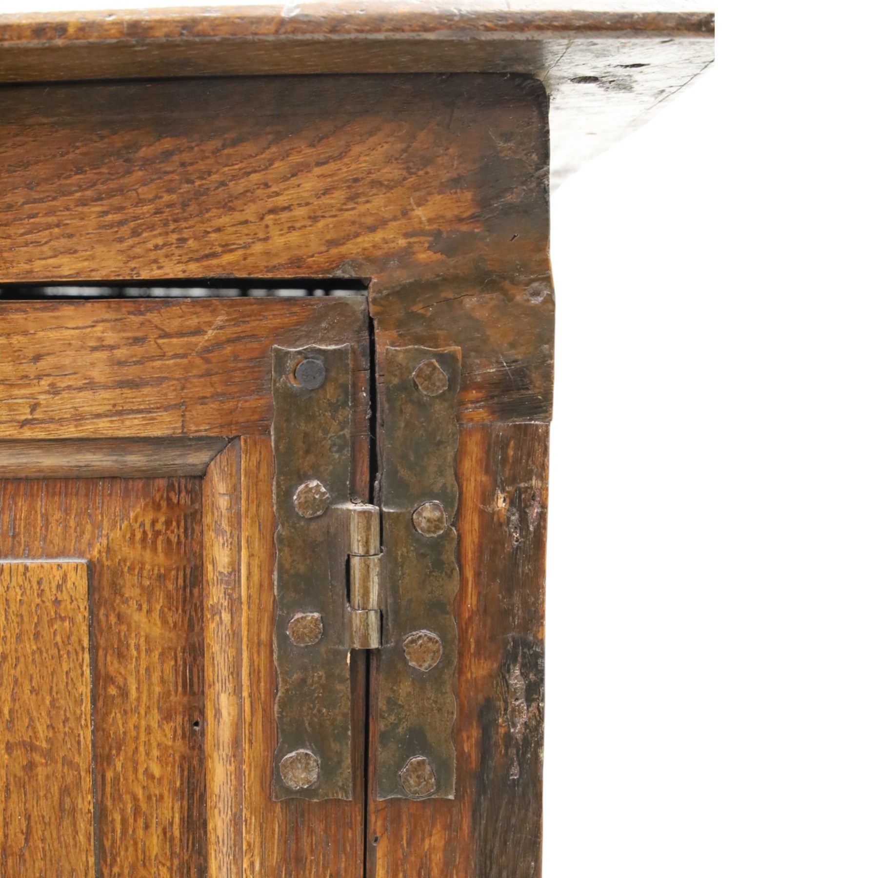 18th century oak hall cupboard, rectangular top with moulded edge, over two panelled hutch-cupboards, the base fitted with six assorted drawers, on large bracket feet