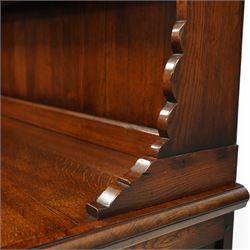 Gostins of Liverpool - Georgian design oak dresser, the two-tier rack with moulded cornice over shaped frieze and end supports, the dresser base with moulded rectangular top over tree drawers and two cupboards, panelled sides, on bracket feet