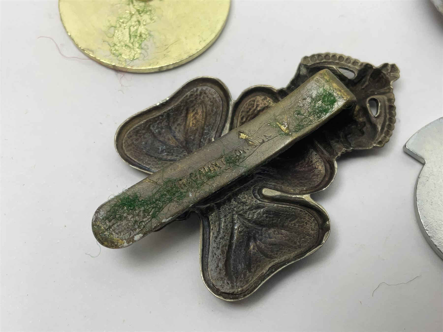 Small collection of Irish related medals, cap badges, buttons, political pin badges etc