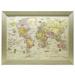 ‘The World Showing Commercial Highways’, mid-20th century colour-printed world map depicting principal railways, shipping and air-mail routes, embellished with printed postal and travel cachets including a British Passport Office, Singapore stamp (1928), Nairobi Airport (1937) and others 49cm x 69cm