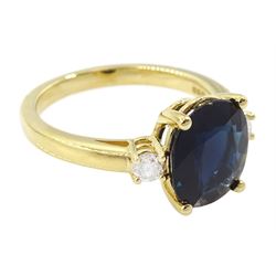18ct gold sapphire and diamond three stone ring, single oval cut sapphire of approx 3.45 carat, with a round brilliant cut diamond set either side, hallmarked