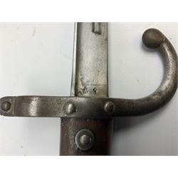 French Model 1874 epee/gras bayonet the 52cm steel piped back blade inscribed St. Etienne Febr 1876, in original scabbard, both numbered 87139, L66cm overall