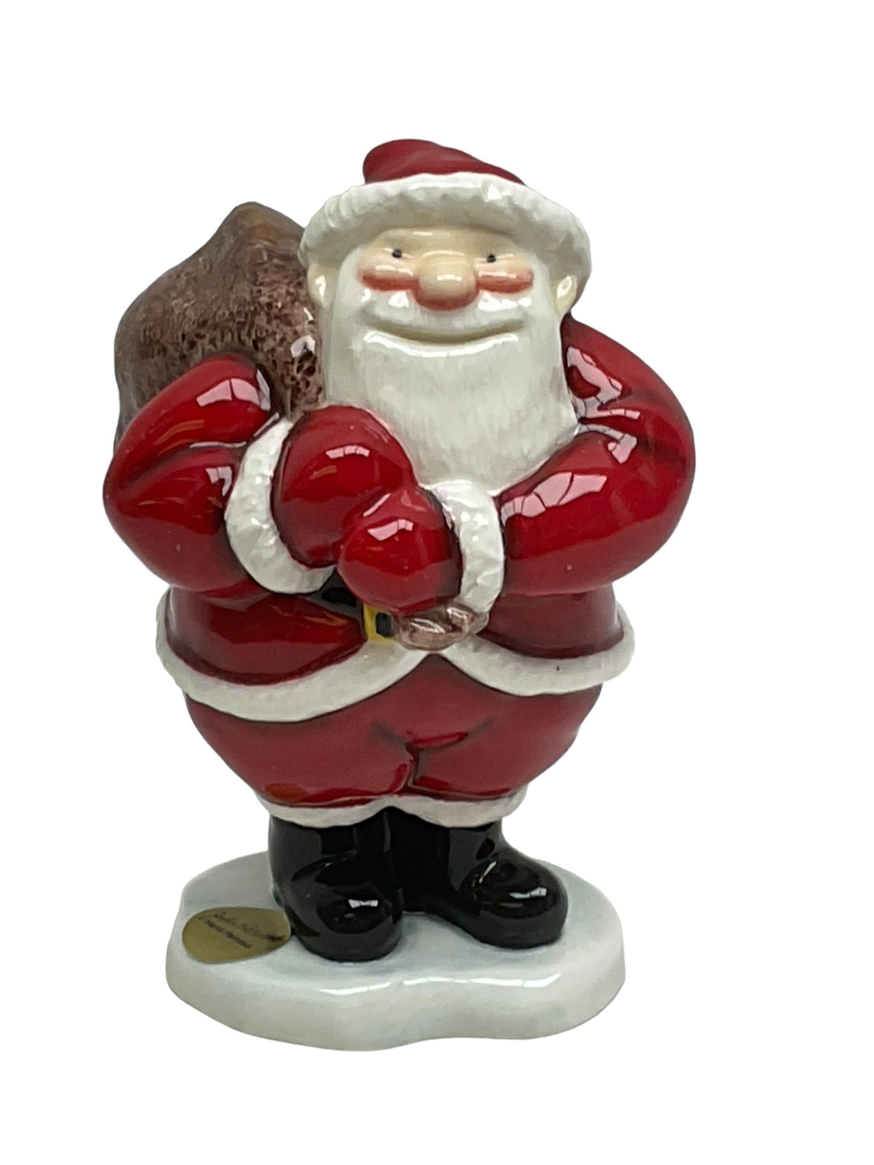 Two Beswick figures, composing The Snowman and Father Christmas, together with Border Fine Arts Enamel dish depicting a scene from The Snowman A3995, all in original boxes 