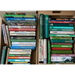  Over fifty books of cricket interest including biographies, historical, instructional, facts and feats, humorous etc, in two boxes  