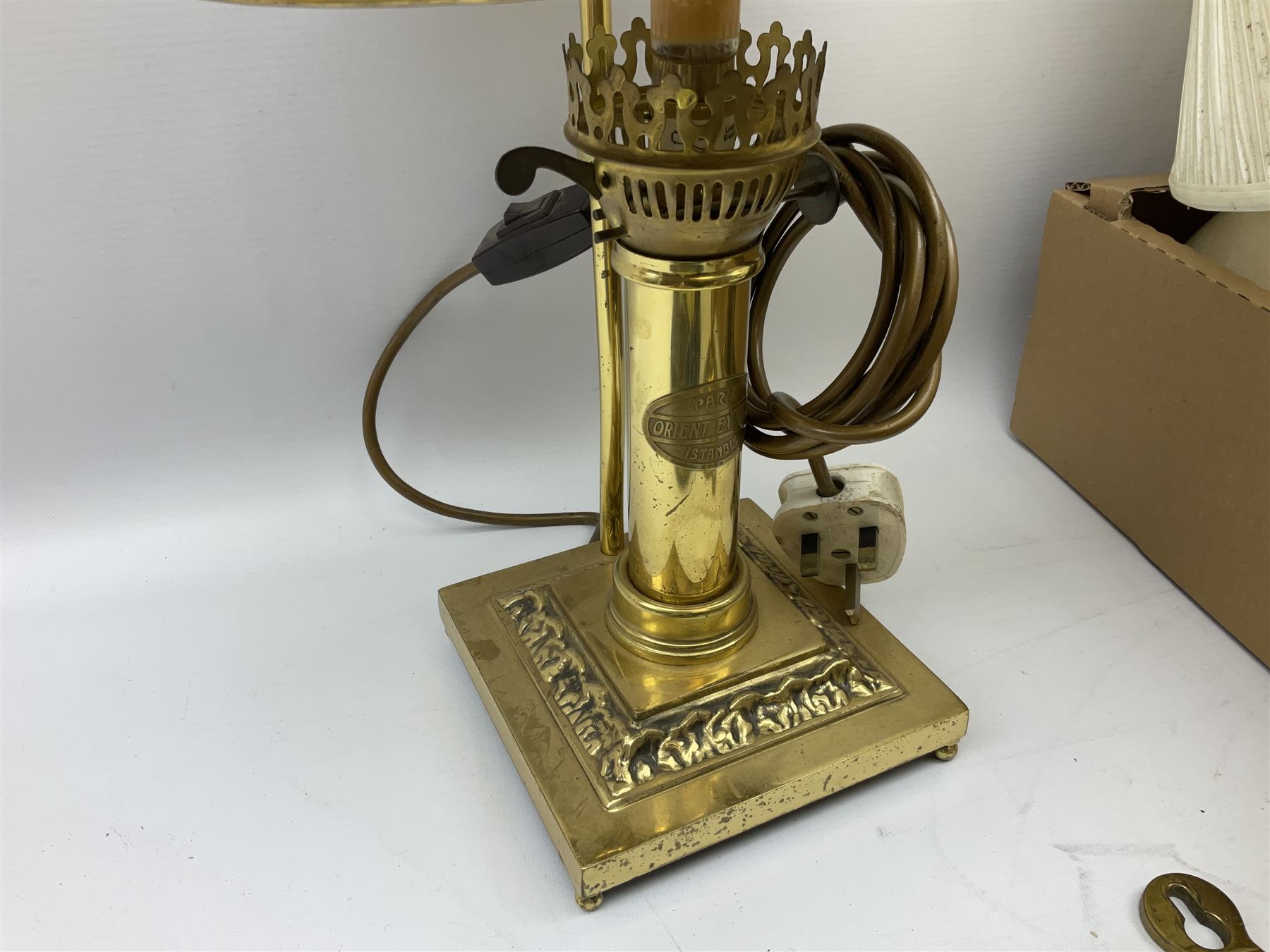 Brassed lamp modelled as a male with basket and fruit after Rancoulet, Tiffany style table lamp, brass table lamp, glass shades etc