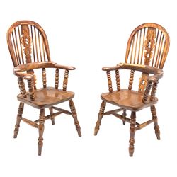 Matched pair elm miniature Windsor armchairs, high stick and pierced fretwork splat back, turned supports joined by H shaped stretchers