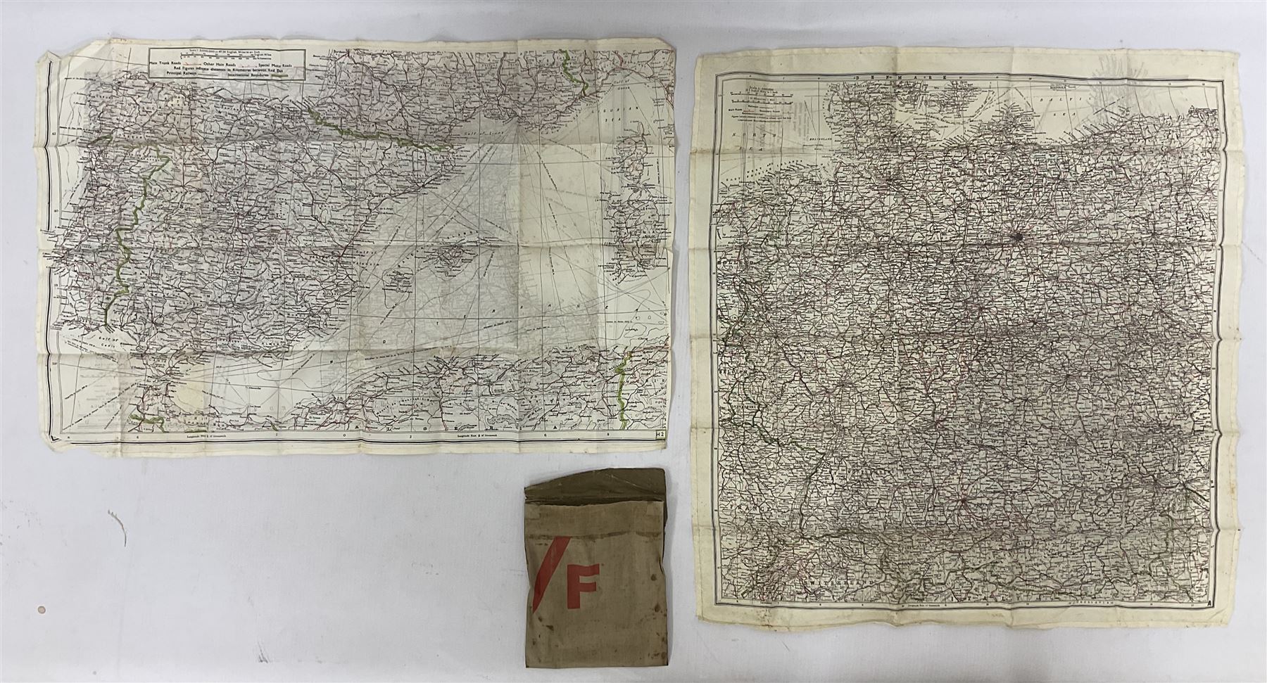 Two WW2 double sided silk escape and evade maps of Europe, comprising: Germany, Belgium, France, Holland, Spain etc,  in canvas envelope stamped Mark II