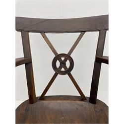 19th century Thames Valley type armchair, yew wood and elm, plain cresting rail over x framed back with moulded roundel motif, dished elm seat, turned supports joined by crinoline stretcher 