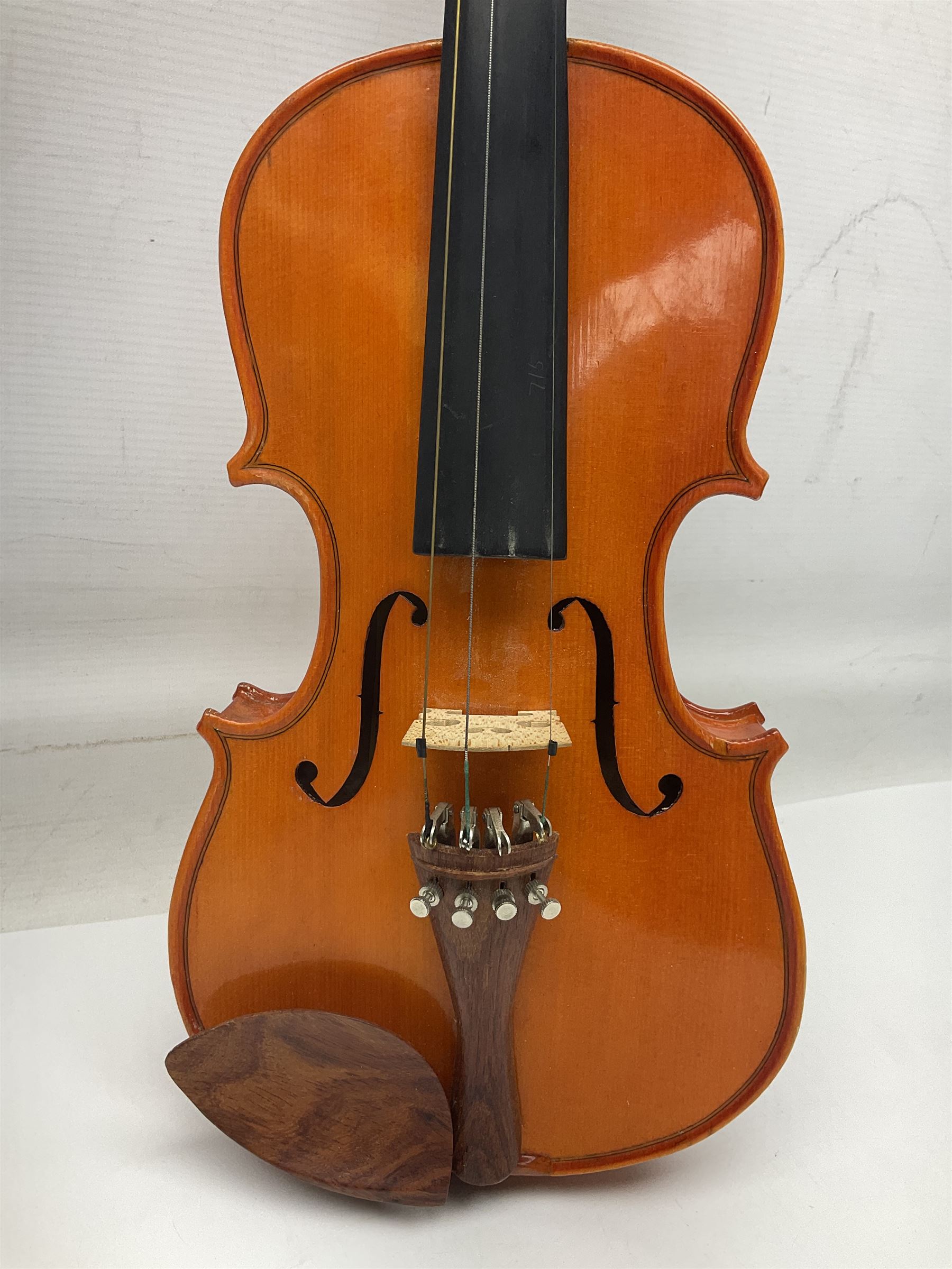 Three Stentor Student violins - three-quarter size with 33cm two-piece back; and two quarter size each with 28cm two-piece back; each in carrying case with bow (3)