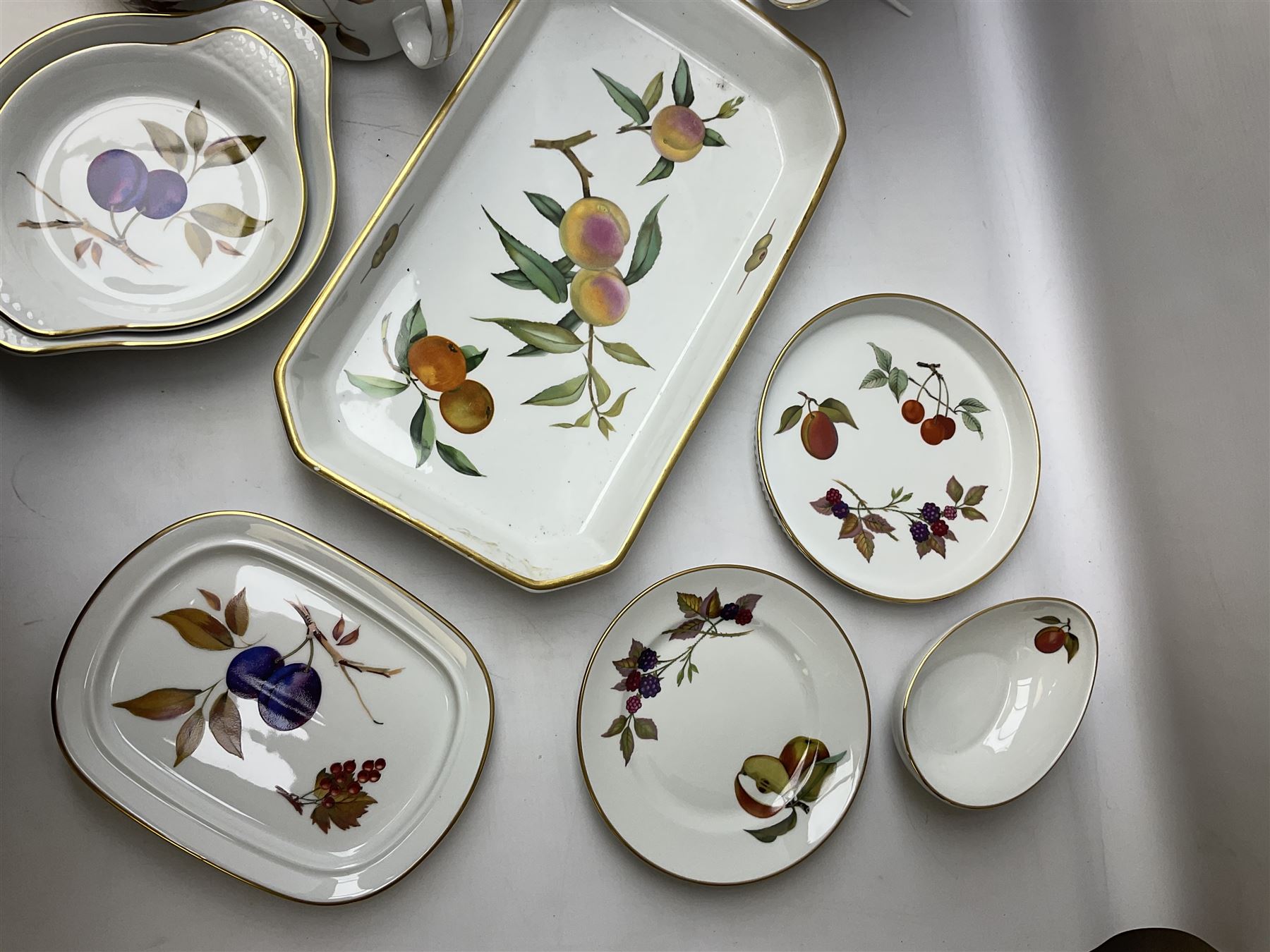 Royal Worcester Evesham pattern dinner wares, to include lidded tureens, eight dinner plates, serving tray, ramekins, jug, seven bowls, egg cups, serving dishes etc, approx 47 pcs, all with printed marks beneath