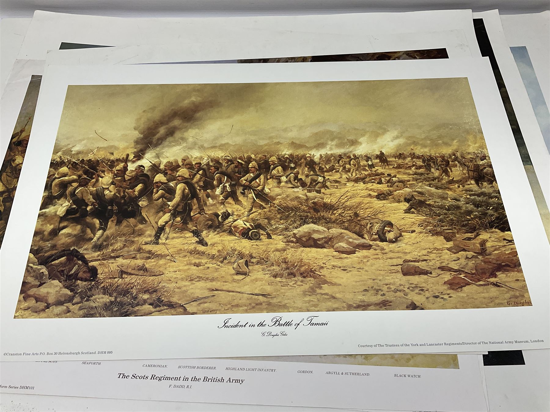 Large poster entitled 'Crests and Badges of the British Army in Daily Use 56 x 86cm; together with twenty-five colour prints of military interest including Crimean War, Boer War, WW2 etc; various sizes; all unframed