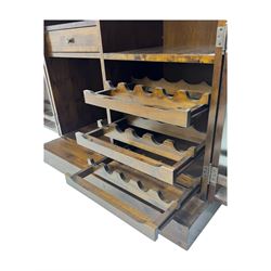 Laura Ashley - contemporary 'Garret' birch and dark chestnut finish bar cabinet, rectangular top with fold-out sides, double front doors enclosing shelving, wine racks, and glass storage, built-in stemware racks and bottle compartments, raised on plinth base