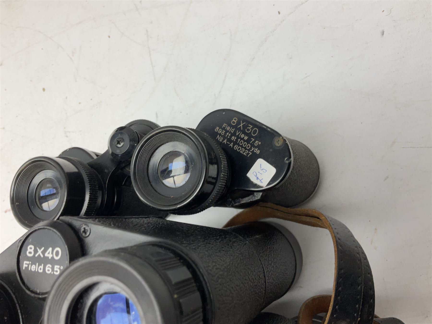 Eleven cased pairs of binoculars to include Summit 8x30,  Concord 8x40, Tasco no. 106 8x - 16x40, Chinon 10x50, Tokina 7x42 Field, Zoom 6x- 12x32 etc