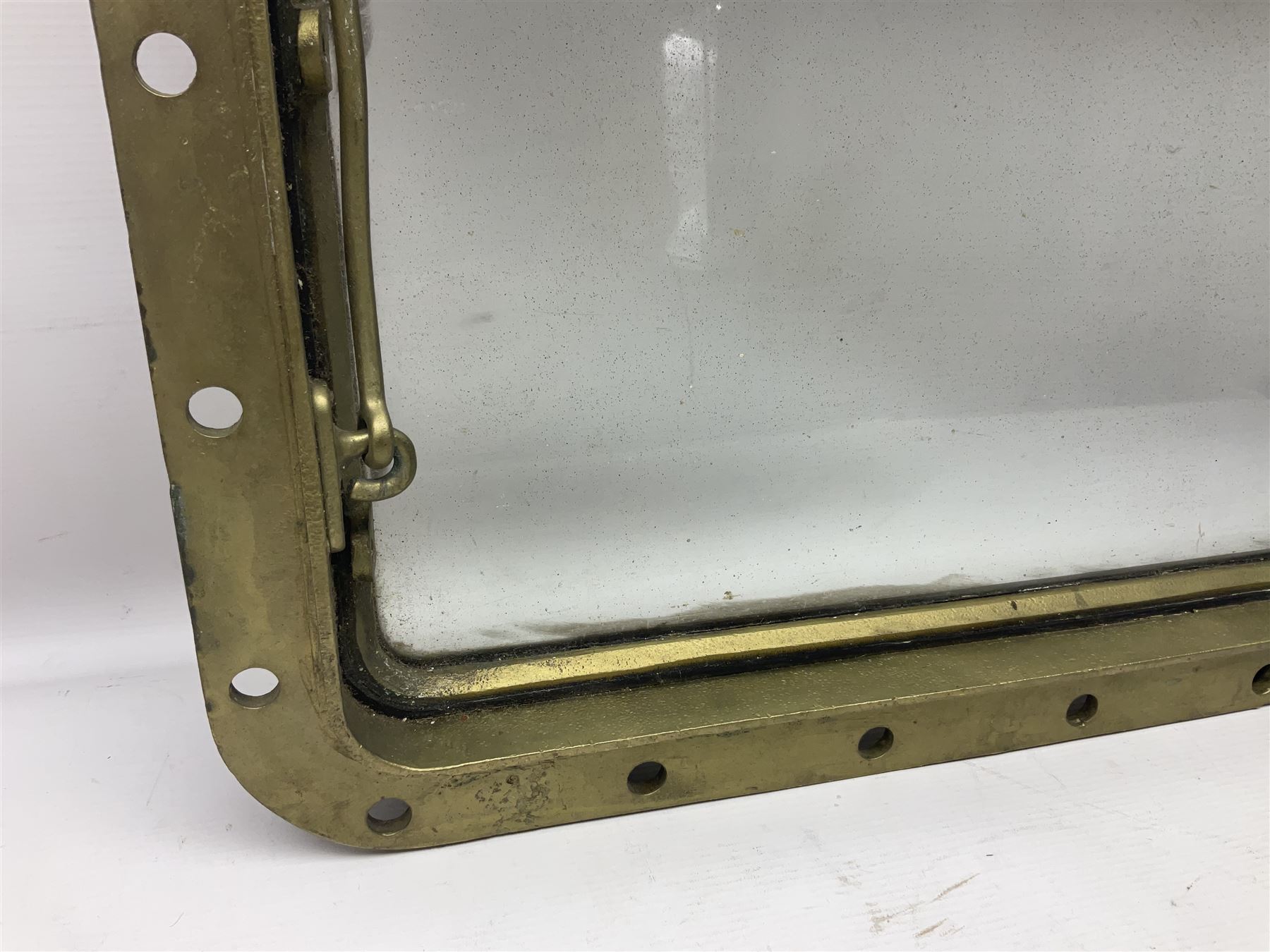 Rectangular brass porthole with hinged window, H46cm, L66cm