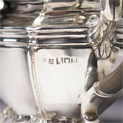 Edwardian silver three piece bachelors tea set of panel sided rectangular form with shell and scroll borders on shell moulded feet London 1903- 1905 Maker Josiah Williams & Co