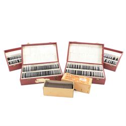 Four Nebro slide boxes containing a collection of photographic slides depicting landmarks,...