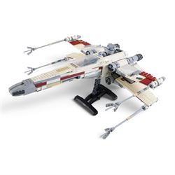 Three Lepin Star Wnrs built models, comprising Red Five X-Wing Starfighter no. 05039, Millennium Falcon no. 05132 and Super Star Destroyer no. 05028