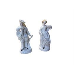 Pair of ceramic figures, modelled as a man and woman in period dress, H15cm