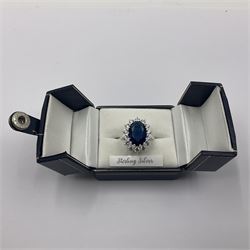 Silver blue oval cubic zirconia cluster ring, stamped 925, boxed 