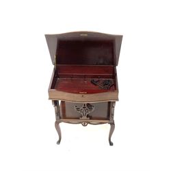 Early 20th century mahogany davenport, raised shaped and pierced back, hinged sloping top enclosing two drawers, four supports joined by solid undertier on cabriole legs