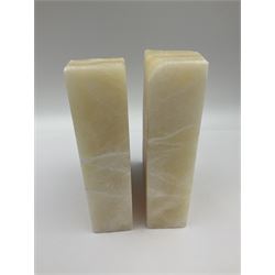 Pair of honey onyx bookends of rectangular form with polished to three sides with a raw outer edge, H18cm 