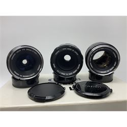 Collection of Canon lenses, to include 'Canon Lens FD 100mm 1:2.8', serial no 12821, 'Canon Lens FD 200mm 1:4' serial no 245313, 'Macro Canon Lens FL 50mm 1:3.5', serial no. 25505, 'Canon Lens FD 135mm 1:3.5 etc, together with other Canon equipment, including Bellows FL, Slide Duplicator etc 