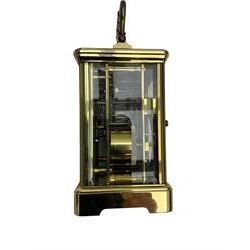 8-day French 20th century corniche carriage clock with a striking movement and repeat work, white enamel dial with Roman numerals, minute track and steel moon hands, dial inscribed St James, London. With a jewelled lever escapement, striking the hours and half hours on a coiled gong. 
