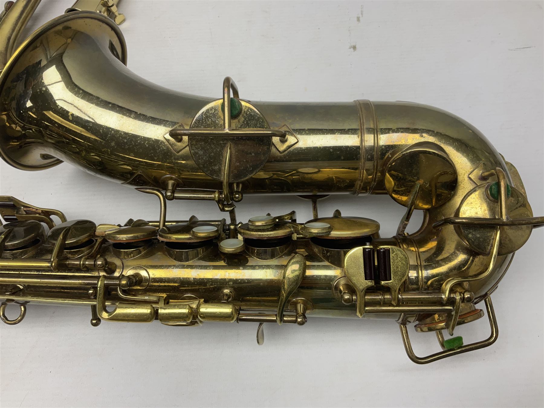 Lacquered brass 'King' alto saxophone inscribed Made by the H.N. White Co.' (Cleveland Ohio) with crook, serial no.84128; also stamped No.1 549 911 and Pat D 8-18-25; in fitted carrying case 