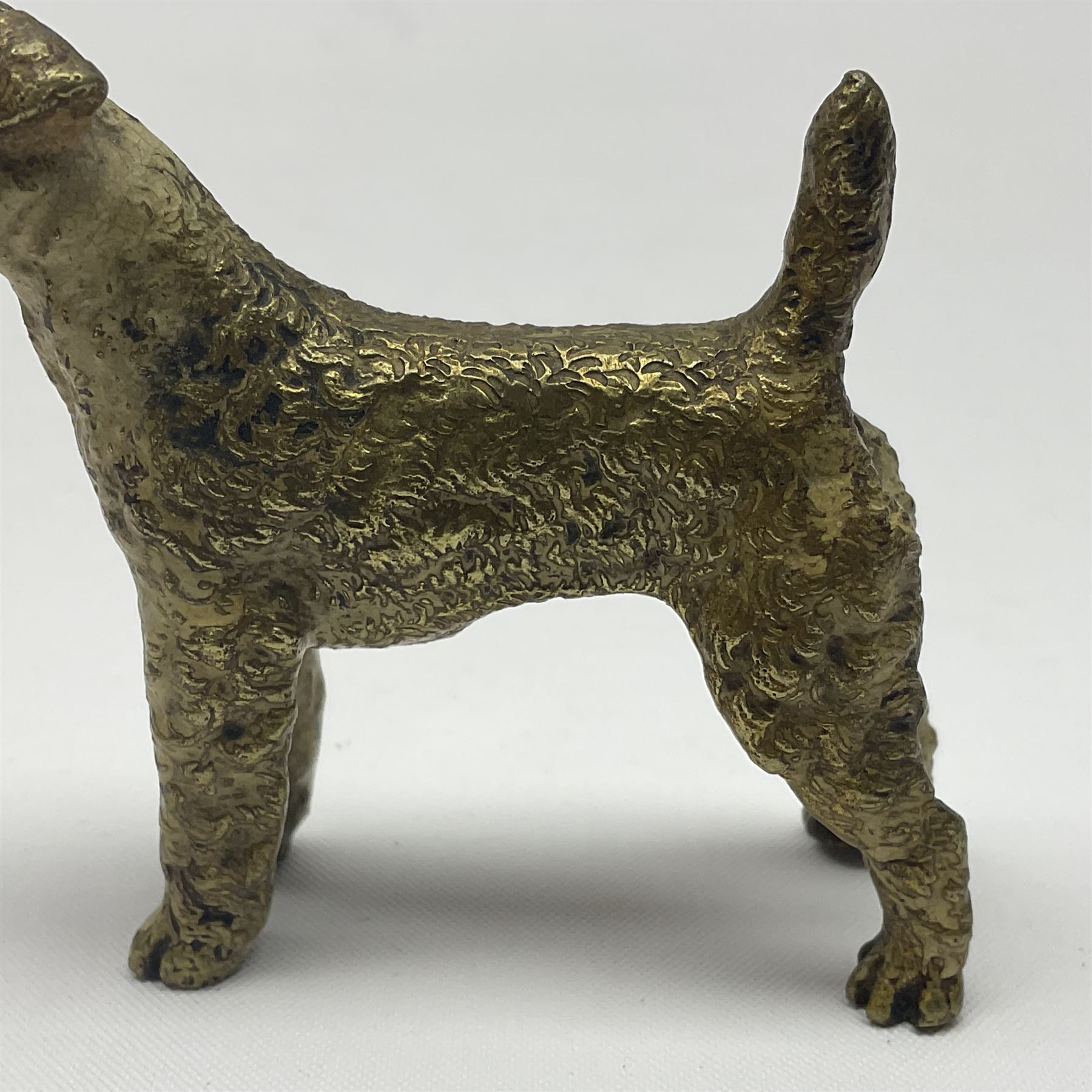 Cold painted bronze model of a seated fox, together with similar standing terrier, fox H5cm