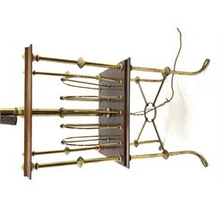 Edwardian walnut and brass standard lamp and combination magazine rack, moulded rectangular top over six division rack supported by brass columns, splayed supports, 33cm x 45cm, H154cm (height excluding the fitting and shade)