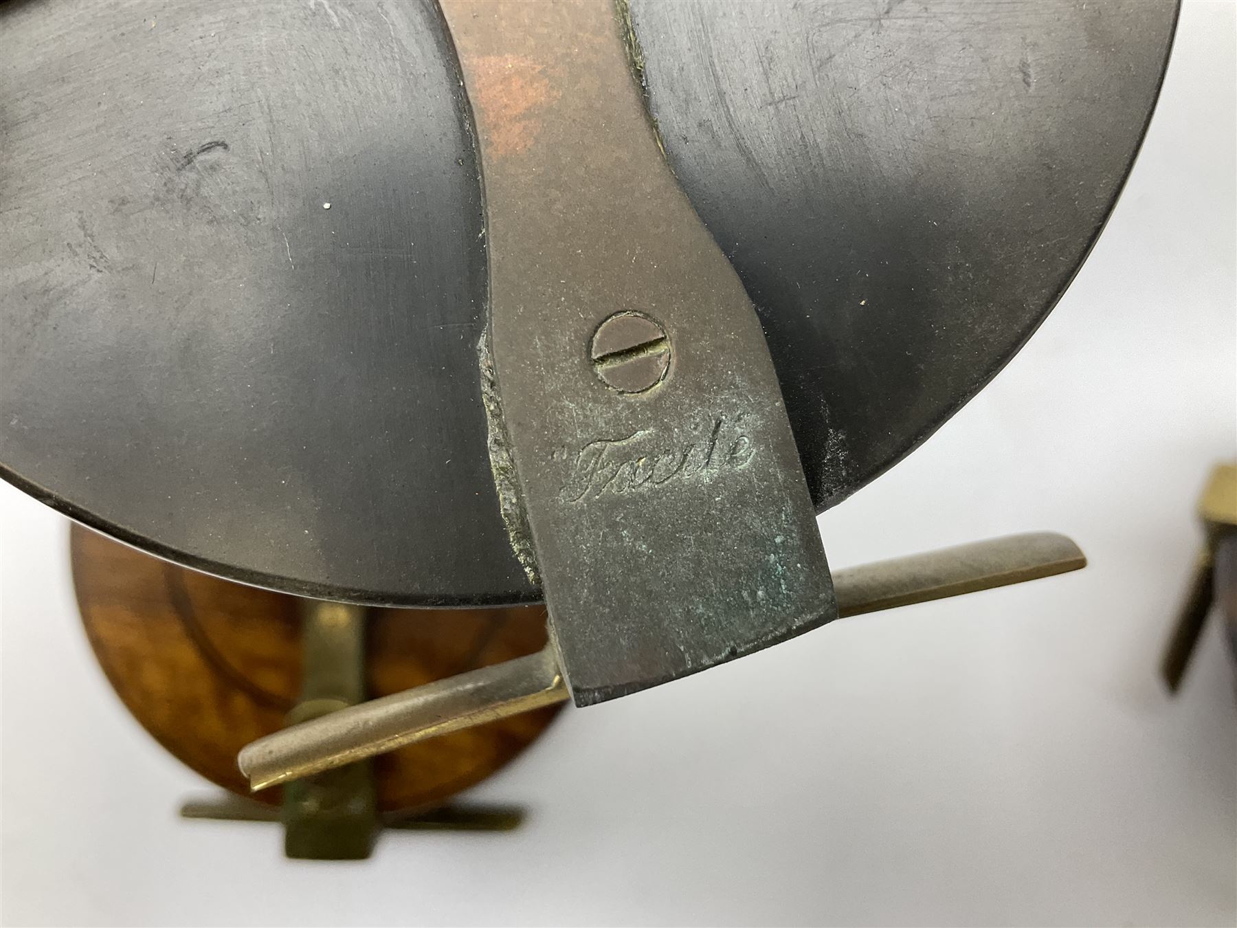 Three Allcocks & Co Ltd reels of brass and wood construction, the largest D4.5 inches