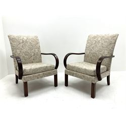 Pair of Parker Knoll easy chairs, upholstered in pale floral fabric, scrolling arms, raised on square supports 