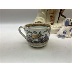 Two Staffordshire pottery flat back figures of the lion slayer, together with pair of staffordshire style dogs and a Victorian cup and saucer 