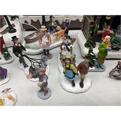 Christmas decorations; Premier LED Christmas Village scene with moving train, together with three Lumineo christmas scenes, and other similar 