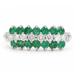 18ct white gold three row diamond and emerald ring, set with eight round brilliant cut dia...