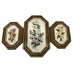Set of three capo-de-monte wall plaques, depicting floral decoration in octagonal frame with gilt edging, largest plaque H48, two small plaques H31cm.    