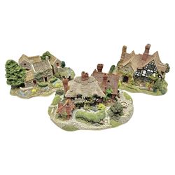 Three Lilliput lanes, comprising Oakwood Smithy, Anne of Cleves and Bluebell Farm, all with deeds and original boxes 