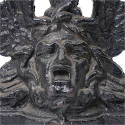 Victorian painted cast iron door porter, cast with a Medusa head and entwined serpents, H27cm