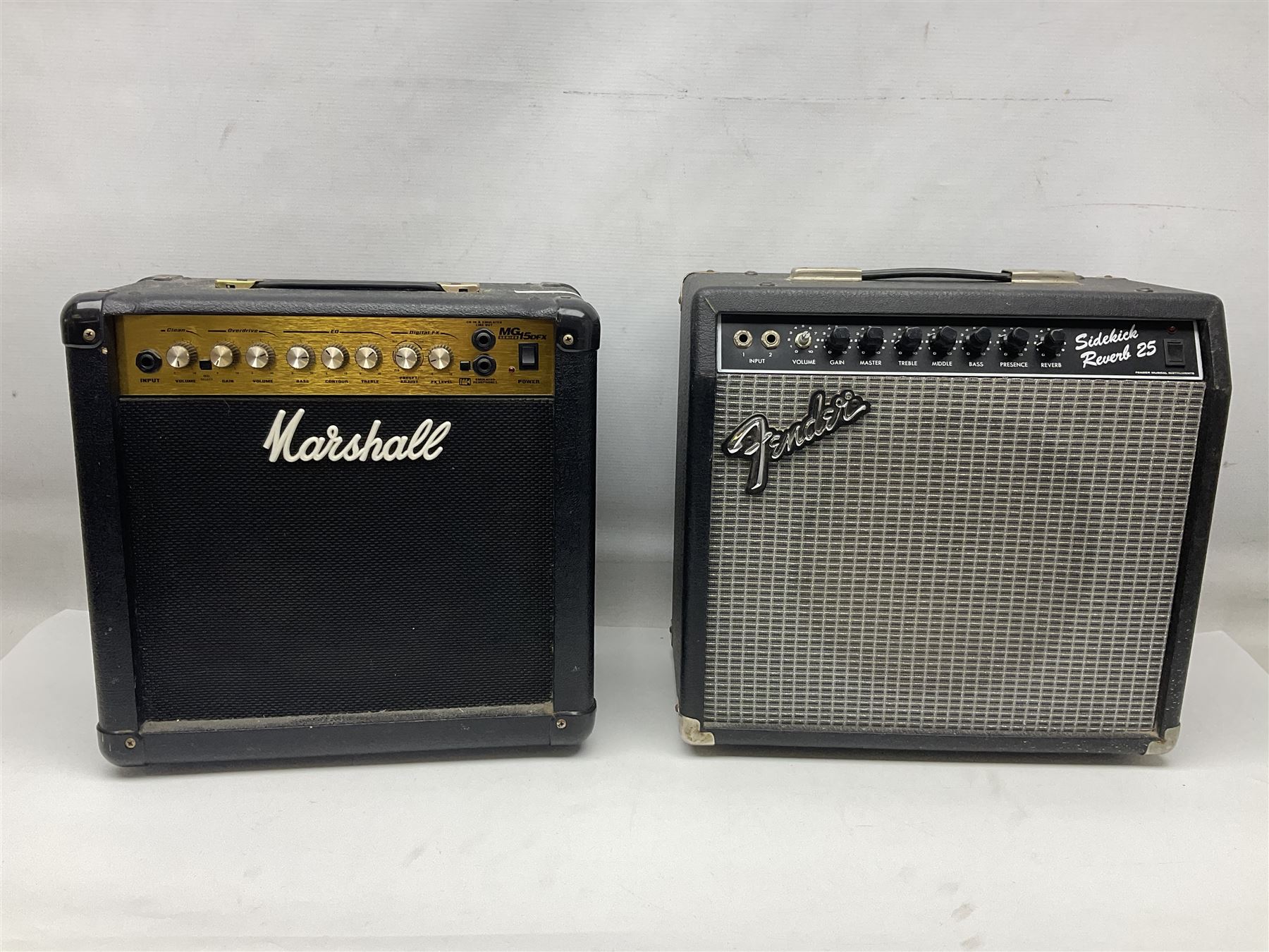 Aria Sinsonido mahogany electric travel guitar, serial no.0502385 L86cm; in original gig bag with earphones and GM11 Minituner; together with Fender Sidekick Reverb 25 amplifier and Marshall MG Series 15DFX amplifier (3)