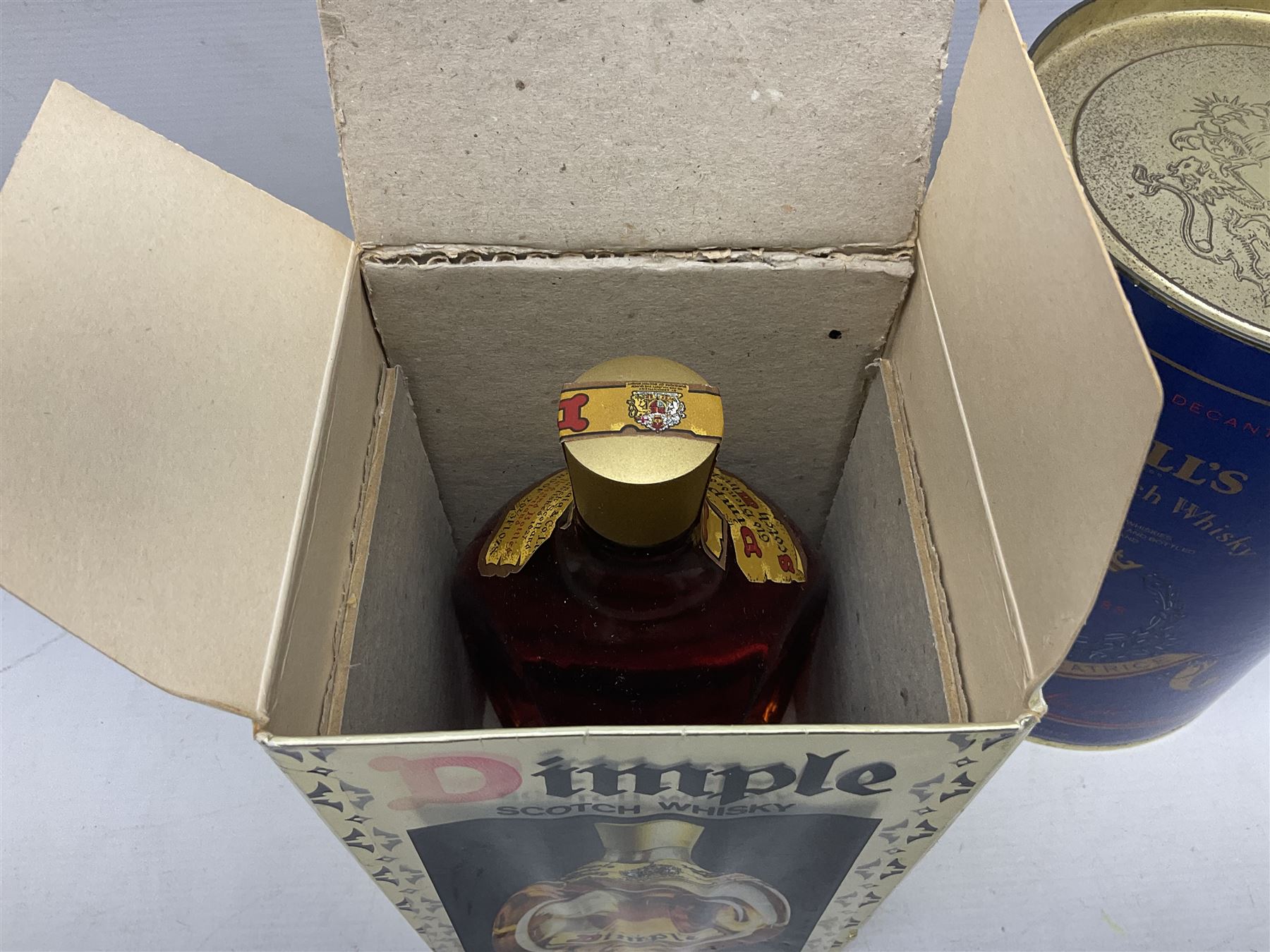 John Haig & Co Dimple Scotch whisky, 26 2/3 fl oz, 70% proof, one bottle and Bells Princess Beatrice whisky in original box, 75cl, 43% vol, one bottle (2)