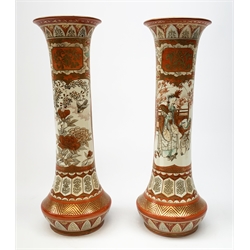 A pair of Japanese Kutani vases, of tapering form, decorated with figural panels, and panels containing blossoms and birds, with character marks beneath. H39.5cm. 