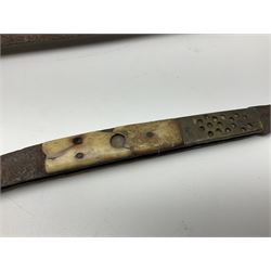 19th century continental folding knife with 15.5cm single edged blade, the pierced brass and iron handle with remains of horn grips L21.5cm overall closed; turned horn handled knife with foliate engraved blade; battlefield relic German 1884/98 knife bayonet; iron spear head; leather covered swagger stick; and two-piece gun cleaning rod