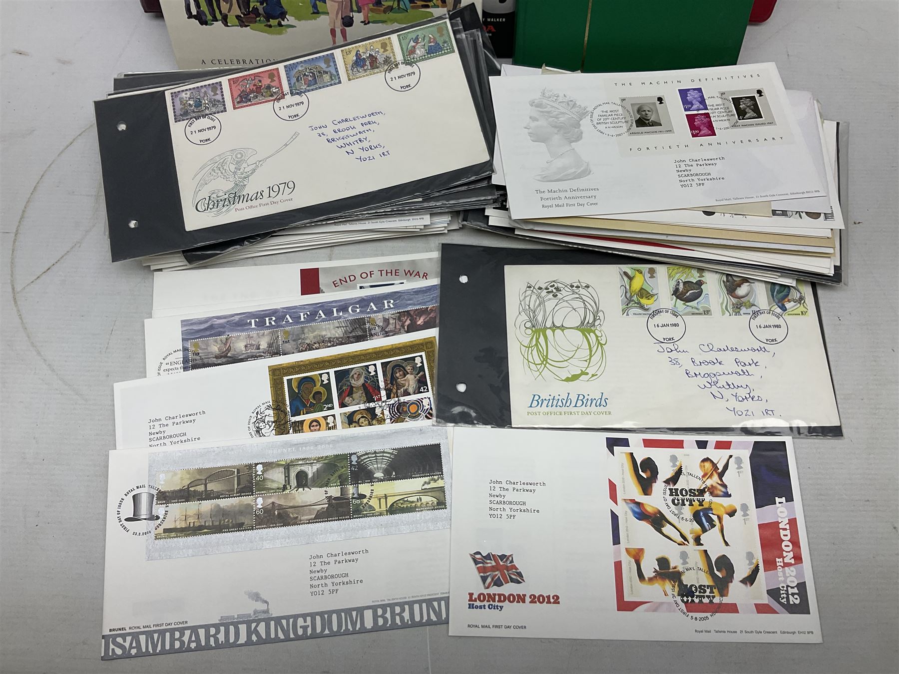 Stamps including Great British Queen Elizabeth II Royal Mail first day covers mostly with special postmarks, various mint pre and post decimal mint stamps, Isle of Man TT100 book by Mick Duckworth complete with stamps, World stamps etc, housed in various albums/folders and loose, in one box