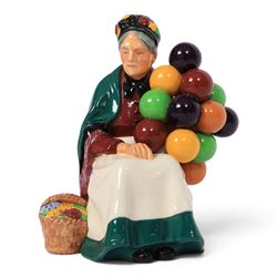 Royal Doulton six balloon seller figures, comprising The Old Balloon Seller HN1315 Biddy Pennyfarthing HN1843, Balloon Girl HN2818, Balloon Boy HN2934, Balloon Lady HN2935 and The Balloon Man HN1954 