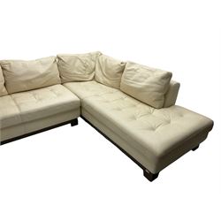 Roche-Bobois - large corner sofa, upholstered in ivory leather with buttoned seat cushions, raised on a stained beech base with bracket feet