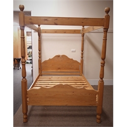  Solid waxed pine 5' kingsize four poster bed, shaped and moulded head and footboard, headboard with pierced decoration, turned posts, H211cm  