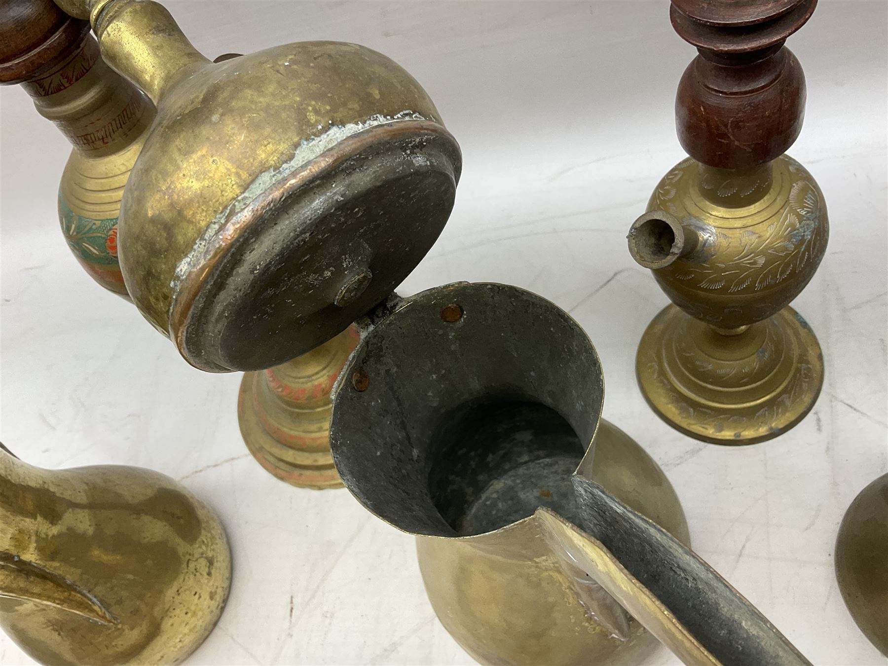 Two brass hookah pipes, and quantity of brass Arabic Dallah coffee pots and other brassware