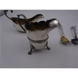 Pair of Georgian silver Old English pattern spoons, hallmarked Thomas Wallis II, London 1791, together with a silver sauce boat, silver cream jug and two other silver spoons, all hallmarked 