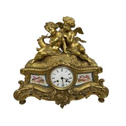 Benoît Félix Richond, Paris - French 8-day gilt mantle clock with surmounted Putti compris...