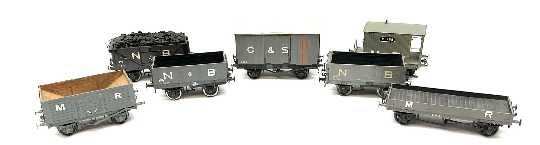 '0' gauge - three scratch-built Midland Railway wagons including brake van, hoppered wagon and long flat bed wagon; three similar North British wagons; and G. & S.W. covered wagon; all unboxed (7)